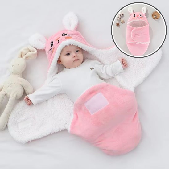 Nid d'ange rose lapin bébé bien emmailloté pour transport