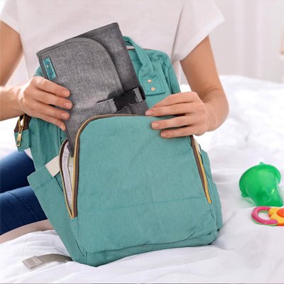 Tapis à langer nomade - Compact et Hygiénique - Le porte - bébé