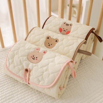 Tapis à langer nomade - UltraCompact™ - Le porte - bébé