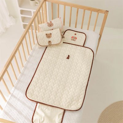 Tapis à langer nomade - UltraCompact™ - Le porte - bébé