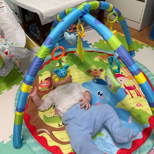 Tapis d'éveil - Éveil&Co™ - Le porte - bébé